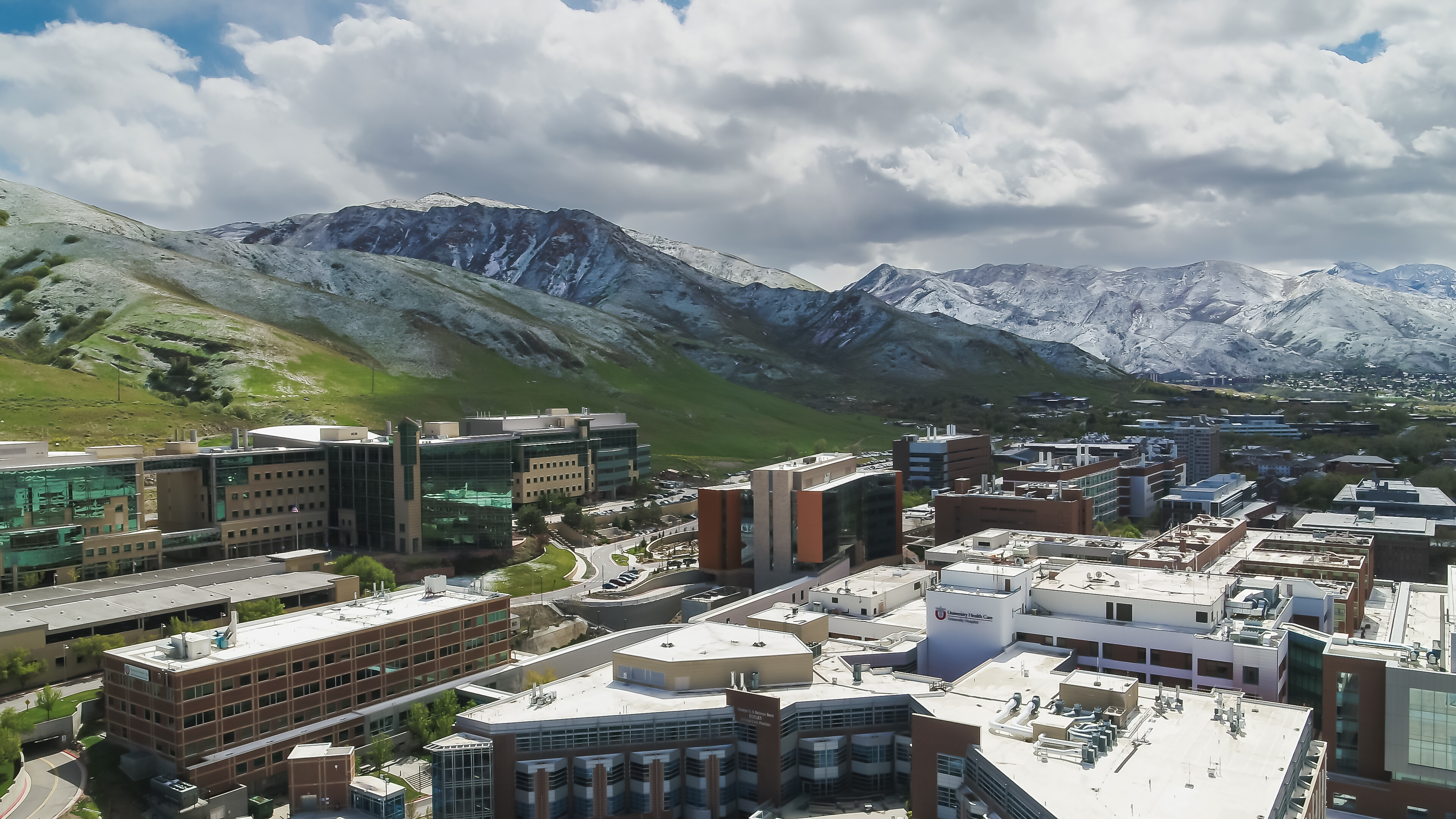University of Utah Health Sciences Campus with snowy mountains in background