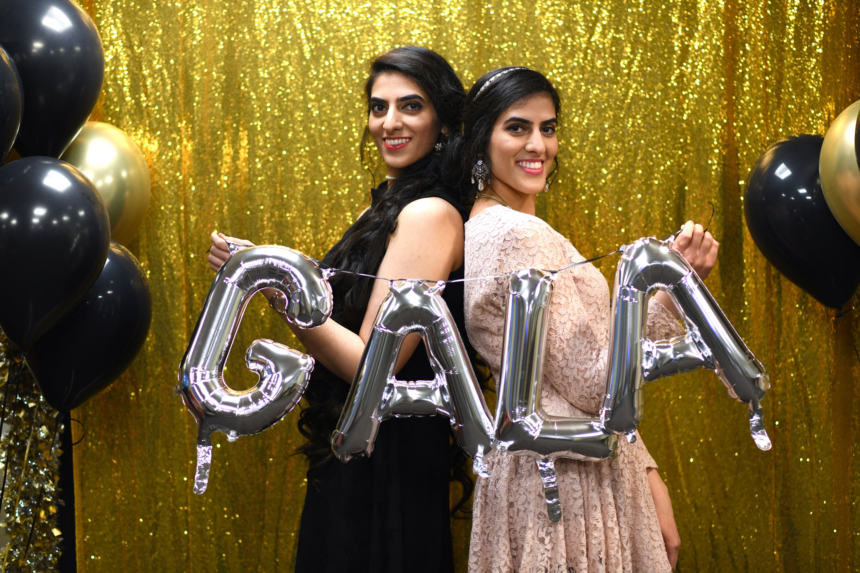 women holding sign