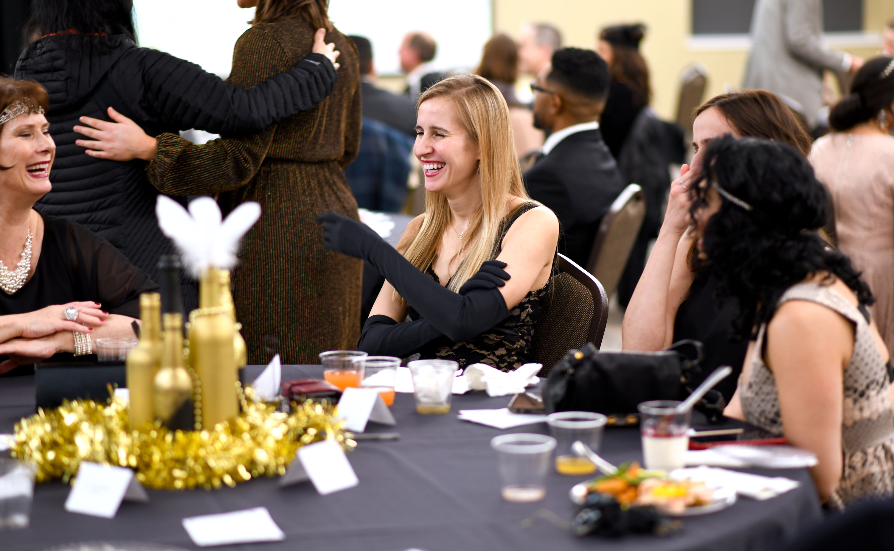 women talking at table