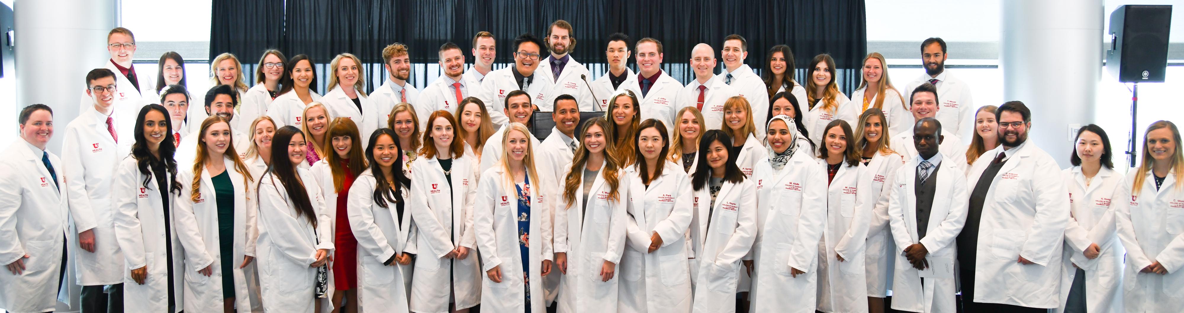 student group in white coats