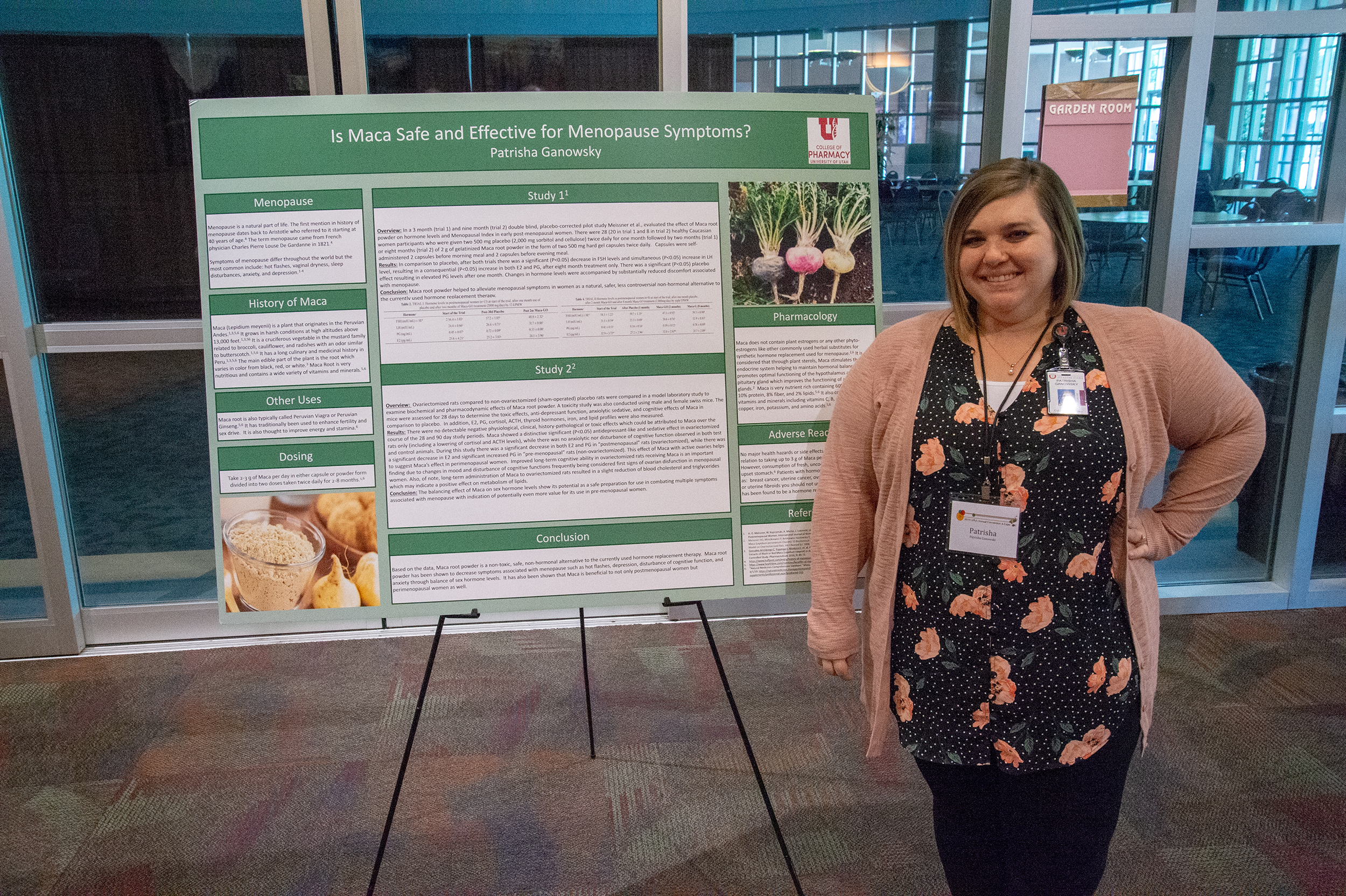 woman presenting poster