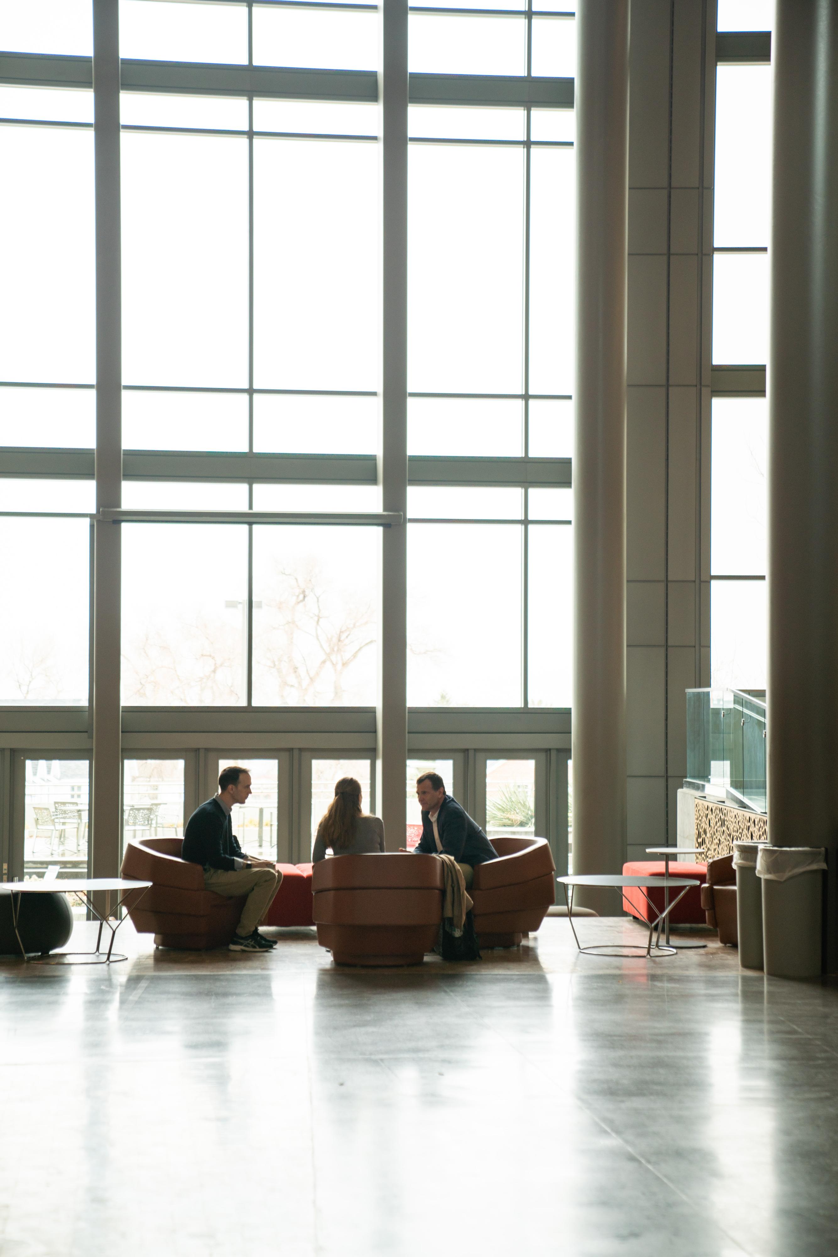 Students sitting in the Skaggs Atrium