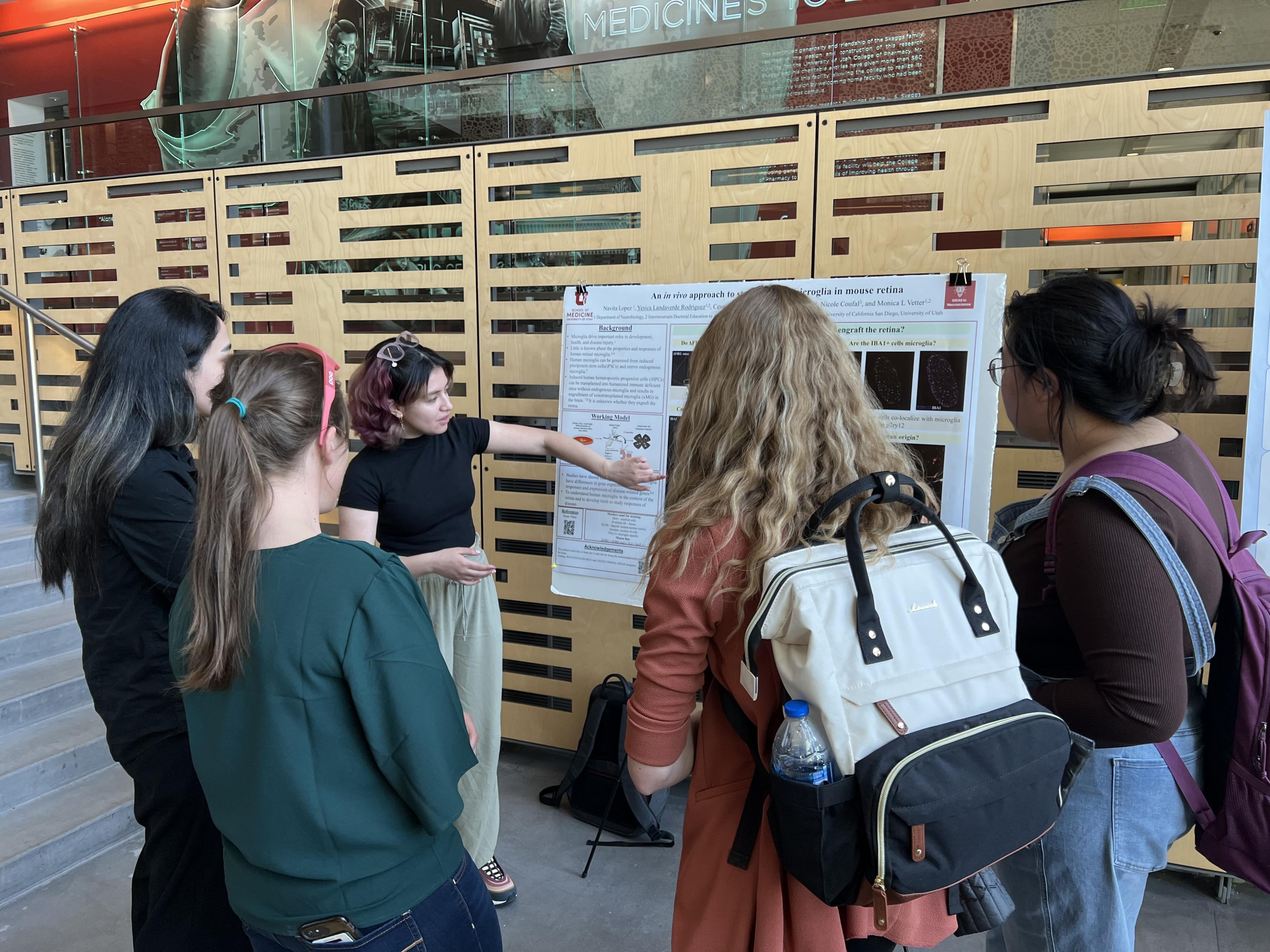 student presenting research at NITG