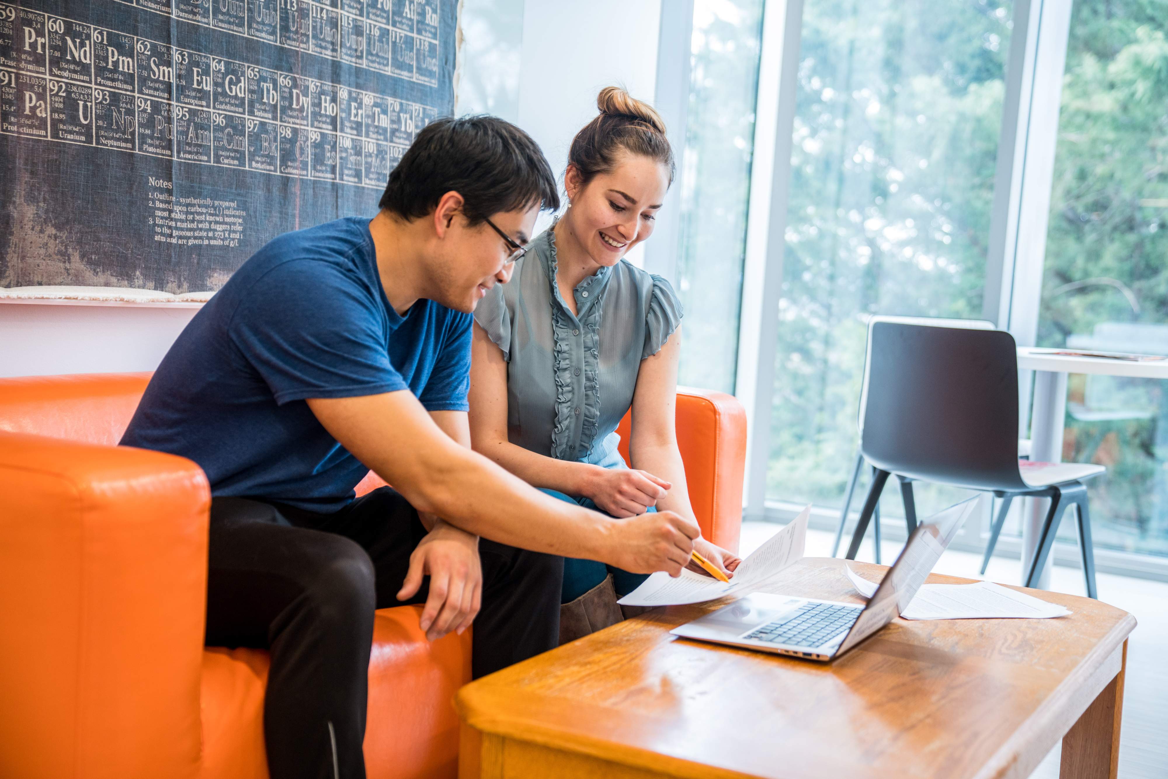 2 trainees sitting in front of a computer