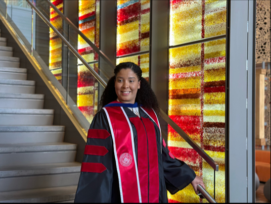 Marysol in cap and gown in skaggs