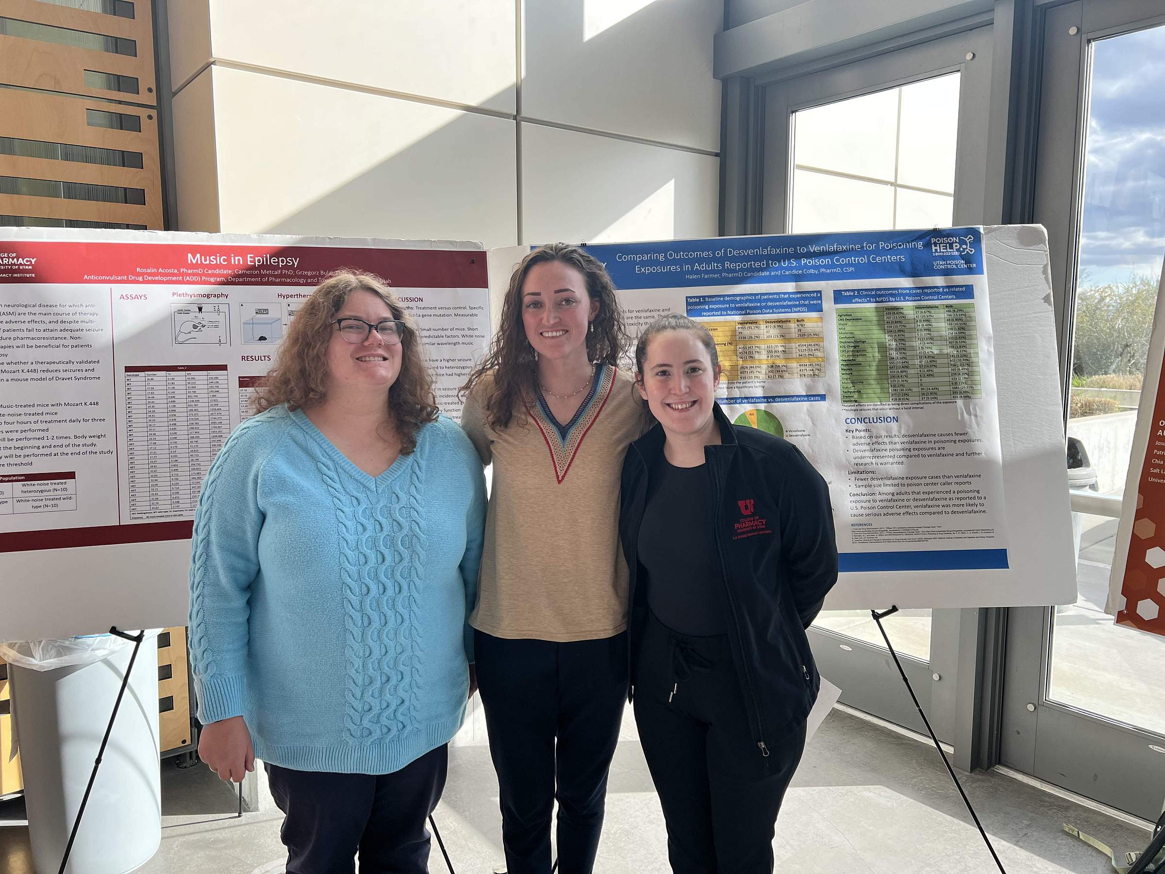 Students pose during a Poster Session in the College of Pharmacy atrium on April 18, 2025.