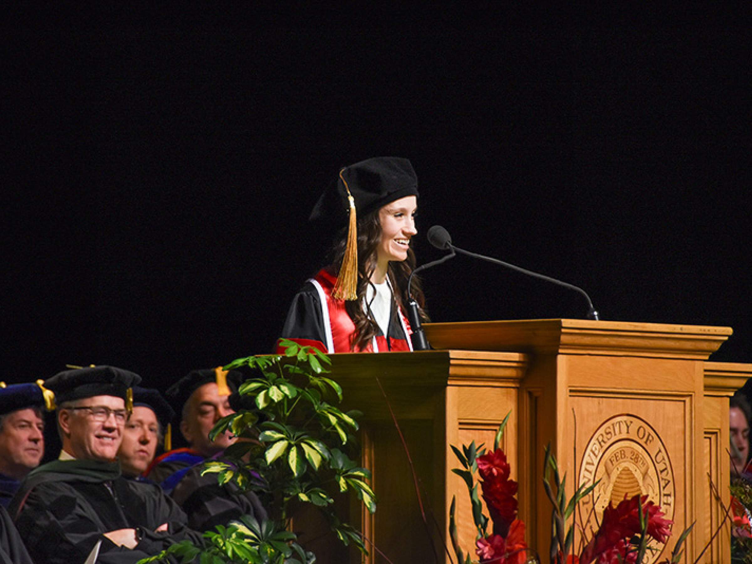 Emily Tippetts speaking at COP graduation