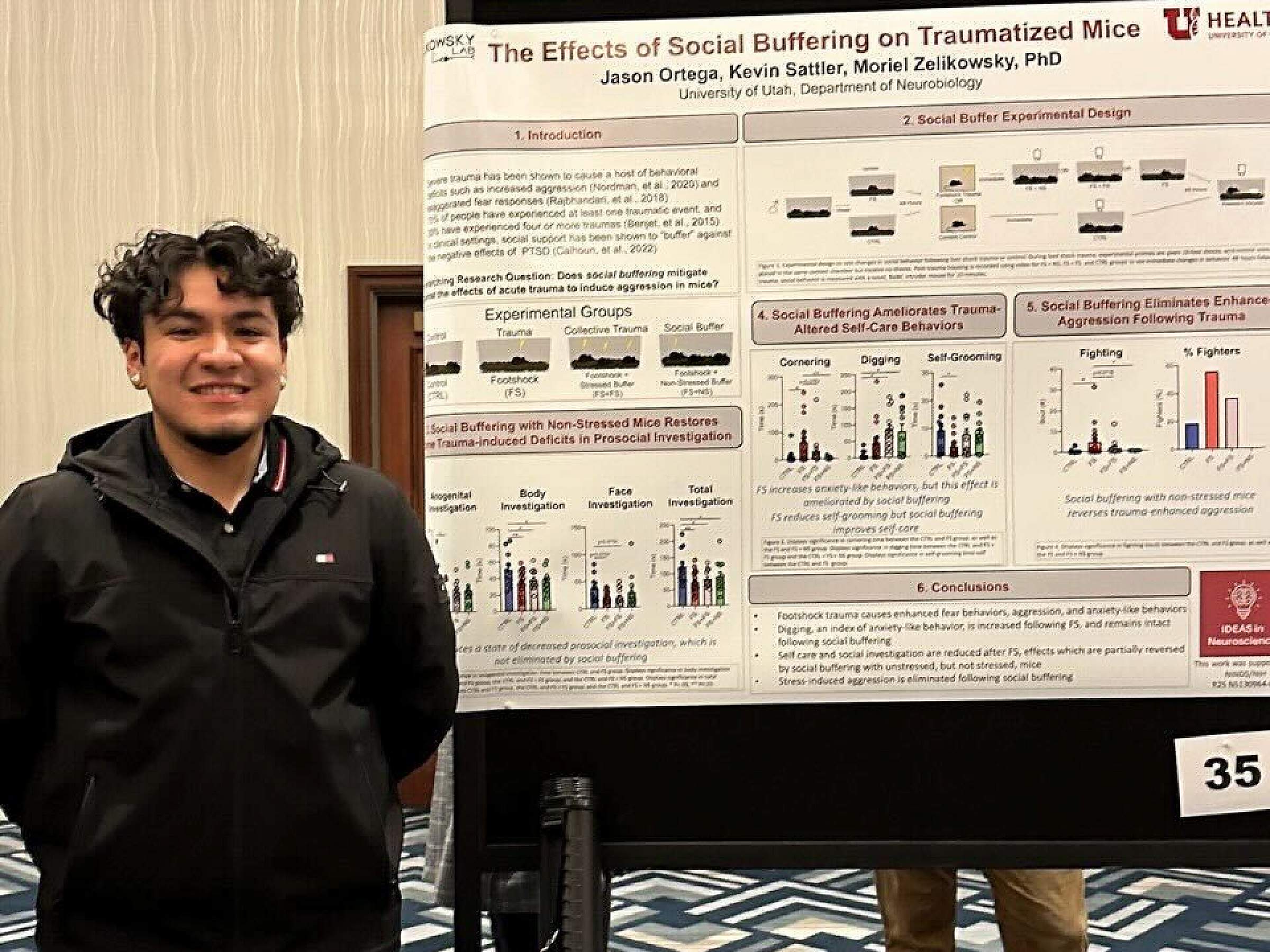 2 students in front of a poster, Skaggs Building
